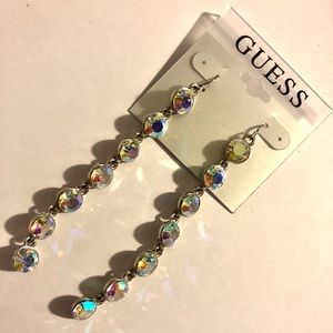 Guess rebels in wonderland dangling earrings.